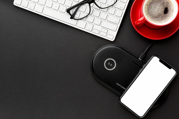 Top view desk concept with smartphone