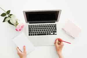 Free photo top view desk concept with woman hands