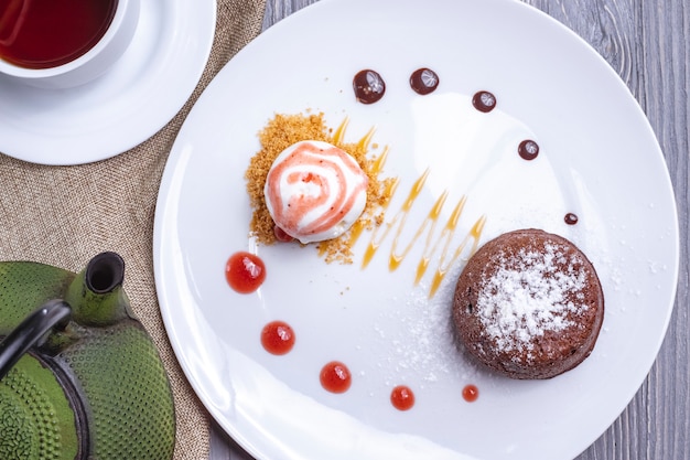 Top view dessert chocolate fondant with ice cream