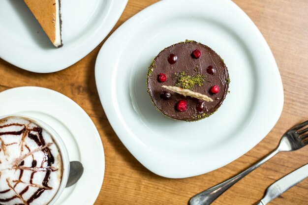 Top view dessert chocolate souffle with berries