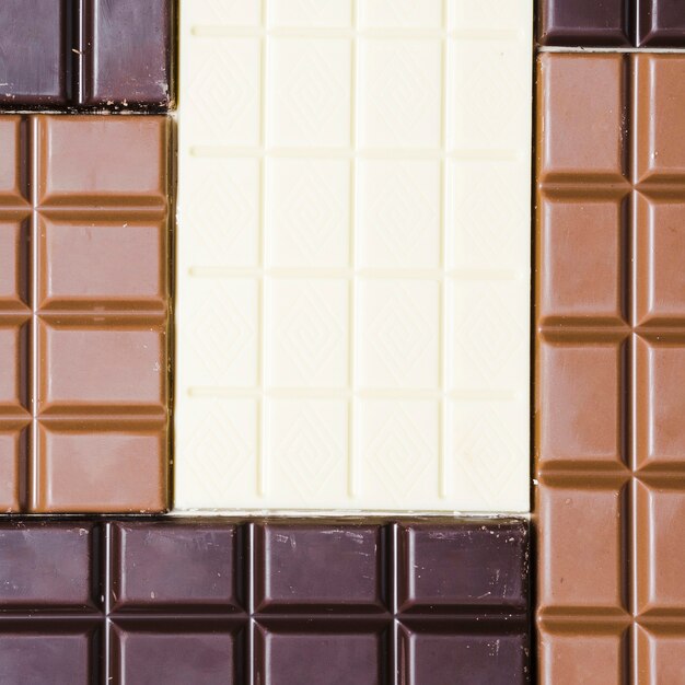 Top view different coloured chocolate bars