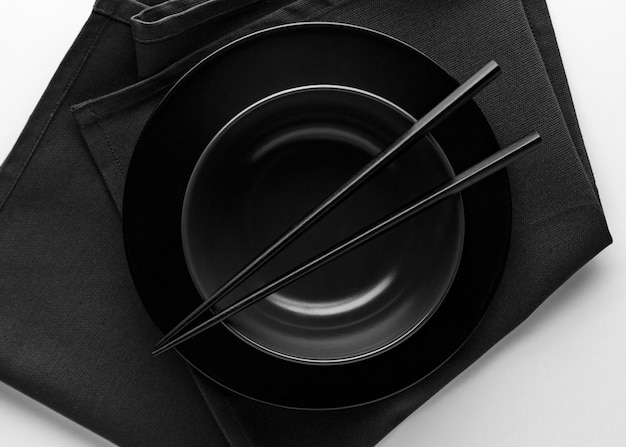 Top view of dinnerware with chopsticks