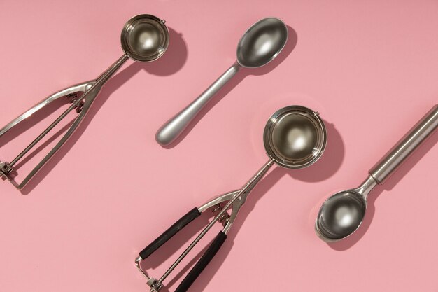 Top view dishers with pink background