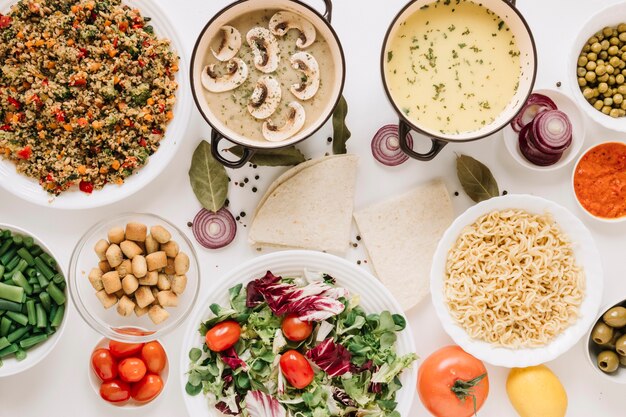 Top view of dishes with noodles and soups