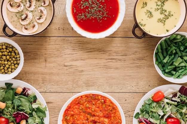 Top view of dishes with soups and copy space