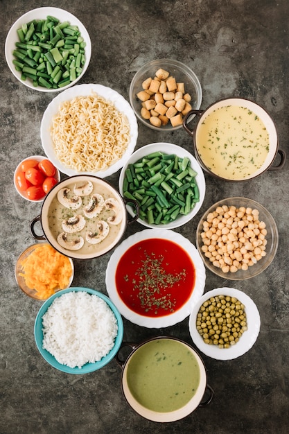 Top view of dishes with tomato soup and rice