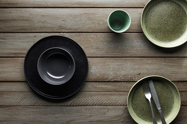 Top view of dishware with cutlery