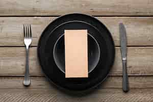 Free photo top view of dishware with knife and fork