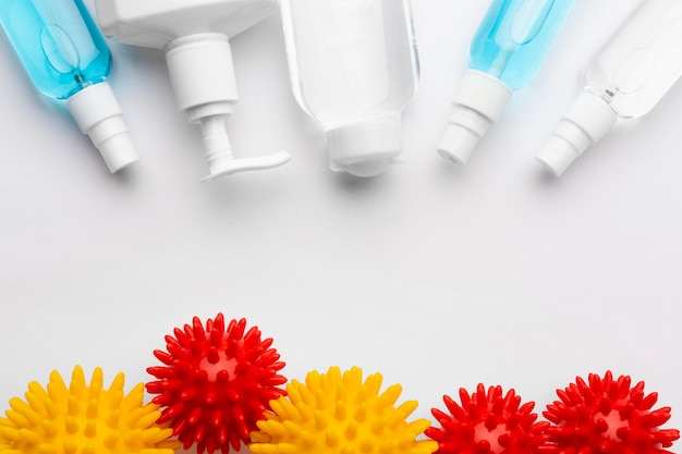 Free photo top view of disinfection products with viruses