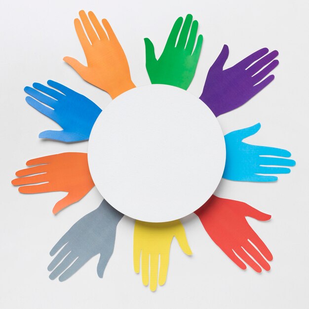 Top view diversity arrangement with different colored paper hands