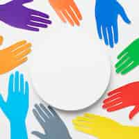 Free photo top view diversity assortment with different colored paper hands