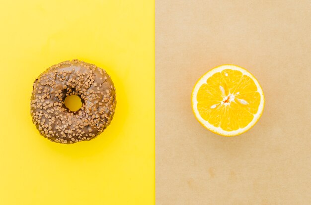 Top view donut vs fruit