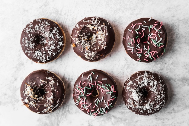 Free photo top view donuts with frosting