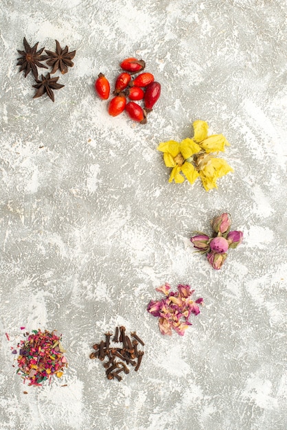 Top view dried flowers dust like on white background tea flower plant flavor