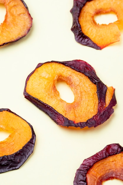 Top view of dried plum slices isolated on a white background