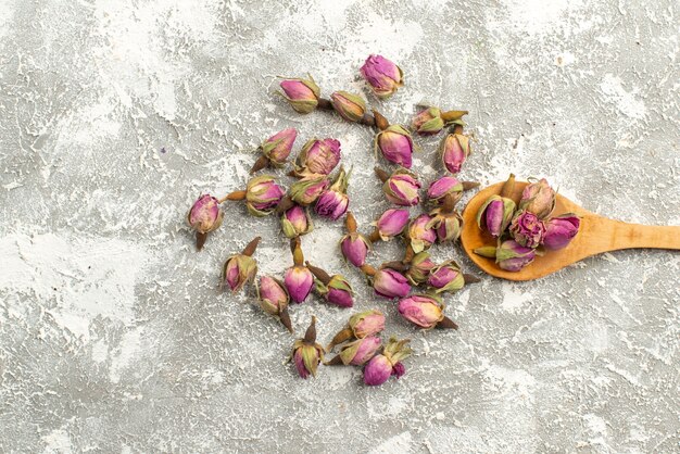 Top view dried purple flowers on white backgorund plant tree flower