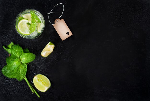 Top view of drink with lemon slices and spearmint