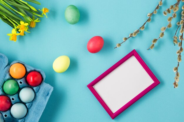 The top view of easter on blue table office workplace