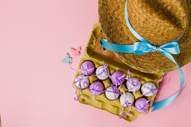 Free photo top view of easter eggs and hat