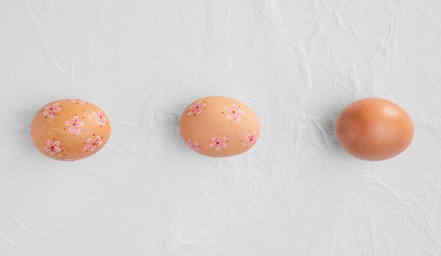 Top view of easter eggs with decorations