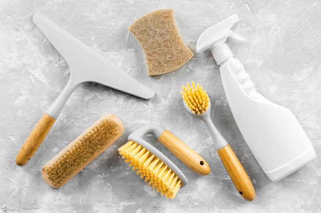 Free photo top view of eco cleaning product with brushes