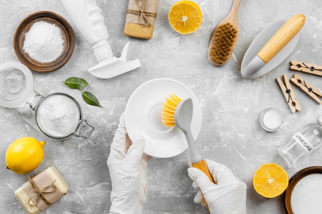 Top view of eco-friendly cleaning products with lemon and baking soda