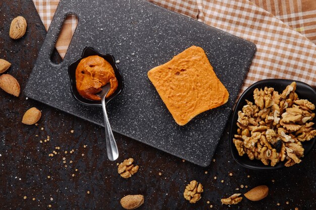 Top view eggplant caviar with white bread walnut and almond