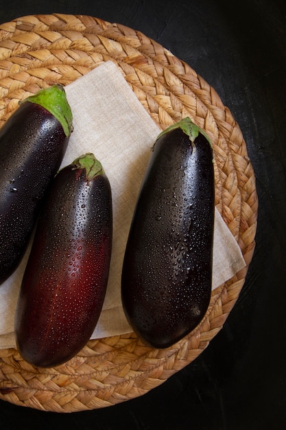 Free photo top view eggplants arrangement