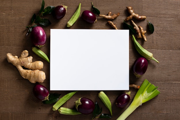 Top view eggplants and ginger with blank rectangle