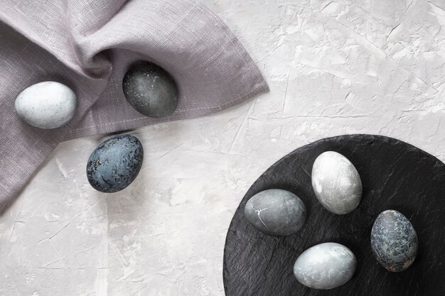 Top view of eggs for easter with slate and fabric