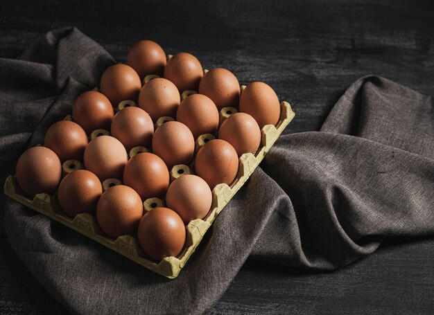 Top view eggs package on kitchen top