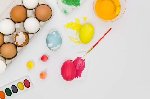 Top view of eggs with paint for easter