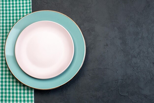 Top view elegant white plate with blue plate on dark background diner silverware femininity hunger grace colourful