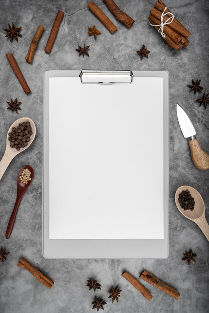 Top view of empty menu with cinnamon sticks and star anise