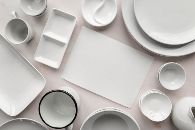 Top view of empty menu with white dishes