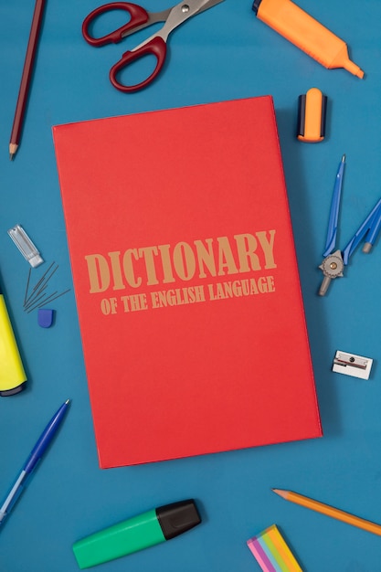 Top view english dictionary and tools