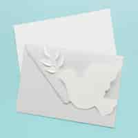Free photo top view of envelope with paper dove