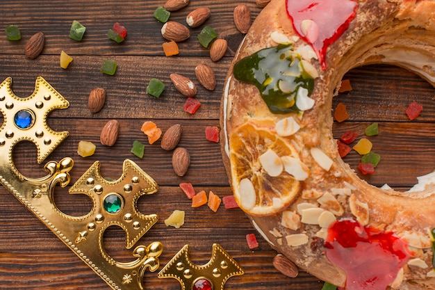 Top view epiphany cake roscon de reyes and almonds