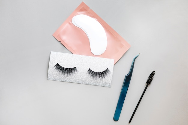 Free photo top view eyelashes and tools arrangement