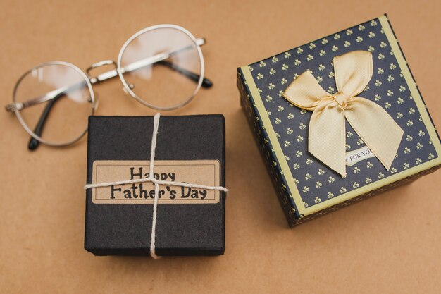 Top view of father's day gifts and glasses