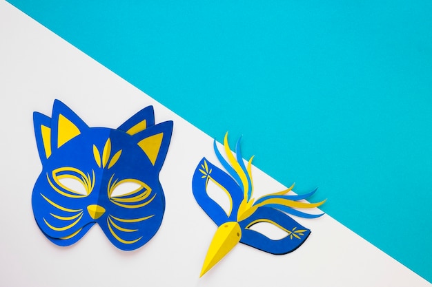 Top view of feline and other mask for carnival with copy space