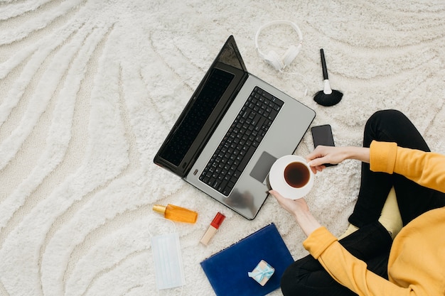 Top view of female blogger streaming at home