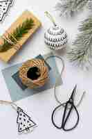 Free photo top view festive christmas ornaments arrangement with card