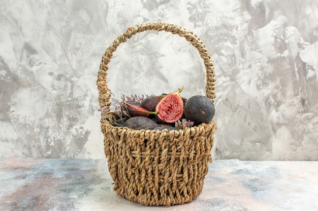 Top view fig basket on grey background