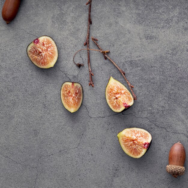 Top view of fig slices and acorns