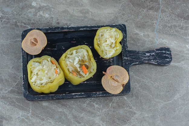 Top view of filled green peppers . Peppers Filled with sauerkrauts. 