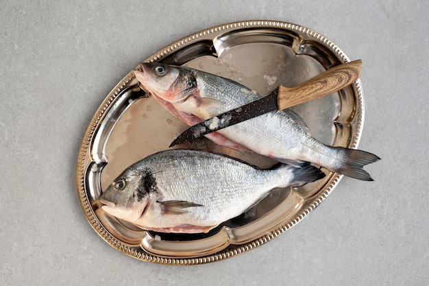 Free photo top view fish ready to be cooked