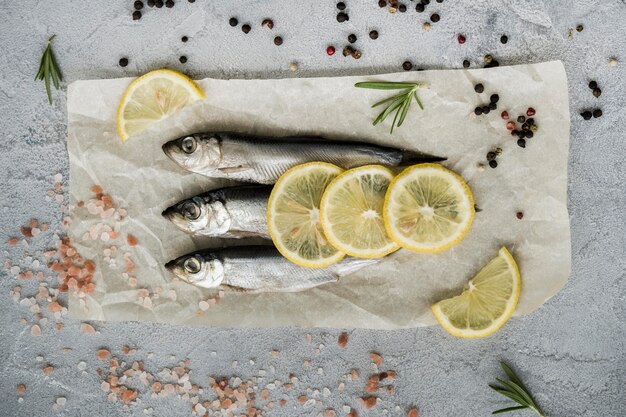 Top view fish with lemon slices