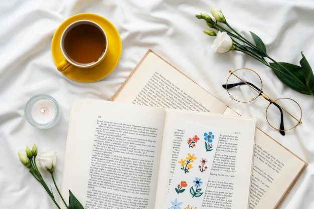 Top view floral bookmark on books