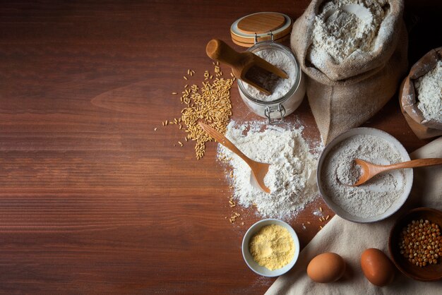 Top view flour and eggs for cooking